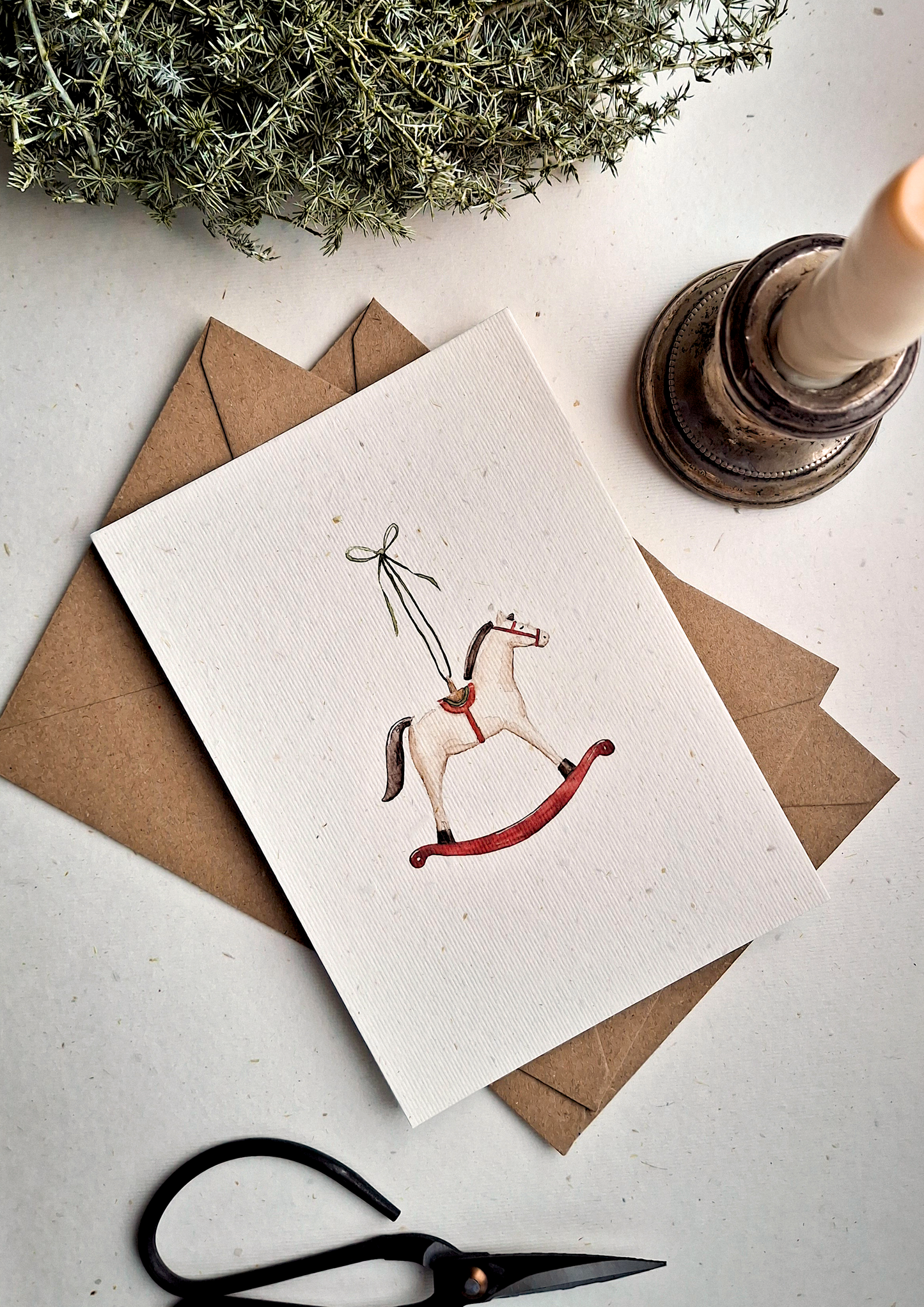 Karte | Schaukelpferd