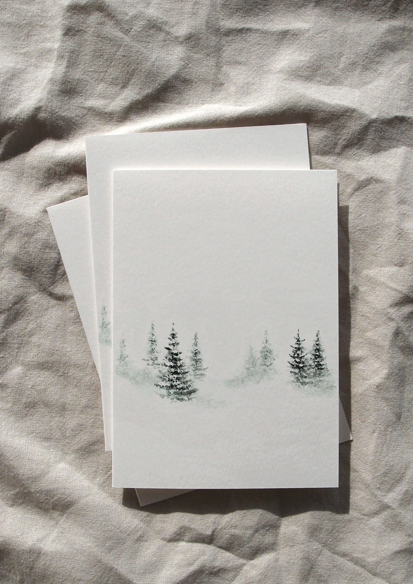 Karte Weihnachten | Tannen im Schnee